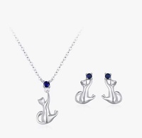 Cat’s Grace — stříbrný set (náhrdelník + náušnice) s modrým kamínkem