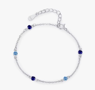 Ocean Dots — stříbrný náramek s modrými krystalky